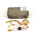 A Victorian Silver plated snuff box containing a 9ct Gold watch strap and other items