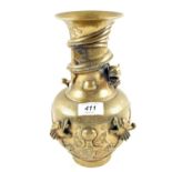 A Chinese Brass vase decorated with dragons chasing the flaming pearl,