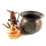 An Arts and Crafts Copper jardinière and a Copper kettle and jug