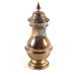 A Silver pepper pot,