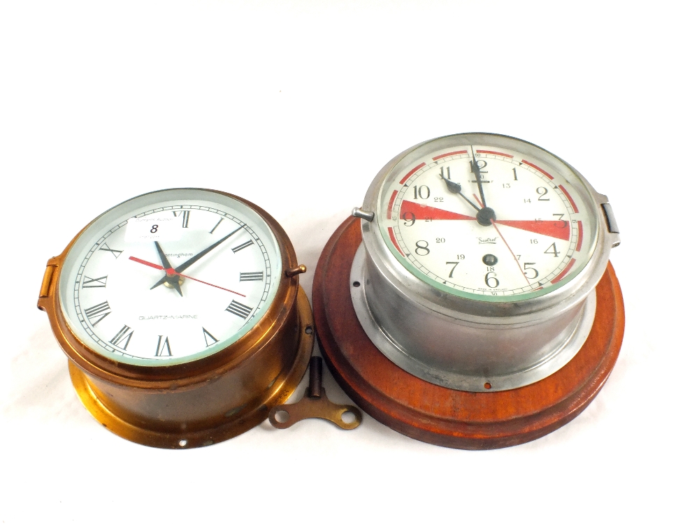 A Sestrel ships clock and one other Quartz Marine,