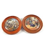 Two framed Victorian pot lids,