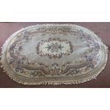 An oval floral Chinese rug