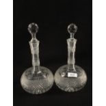 A pair of cut glass decanters