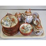 A Japanese eggshell tea set and a Crown Ducal jug and bowl decorated with butterfly foliage