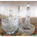 Three cut glass decanters and three bowls