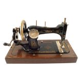 A cased Vibra sewing machine