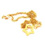 A 9ct Gold bracelet with star charm