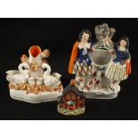 A 19th Century Staffordshire Swan group,