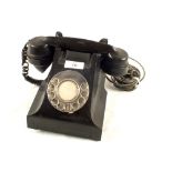 A black Bakelite phone