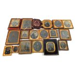 A collection of seventeen Victorian framed photos,