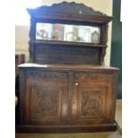 An Oak mirror backed sideboard