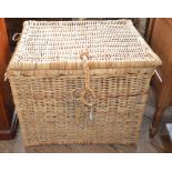 A large wicker trunk and a smaller basket