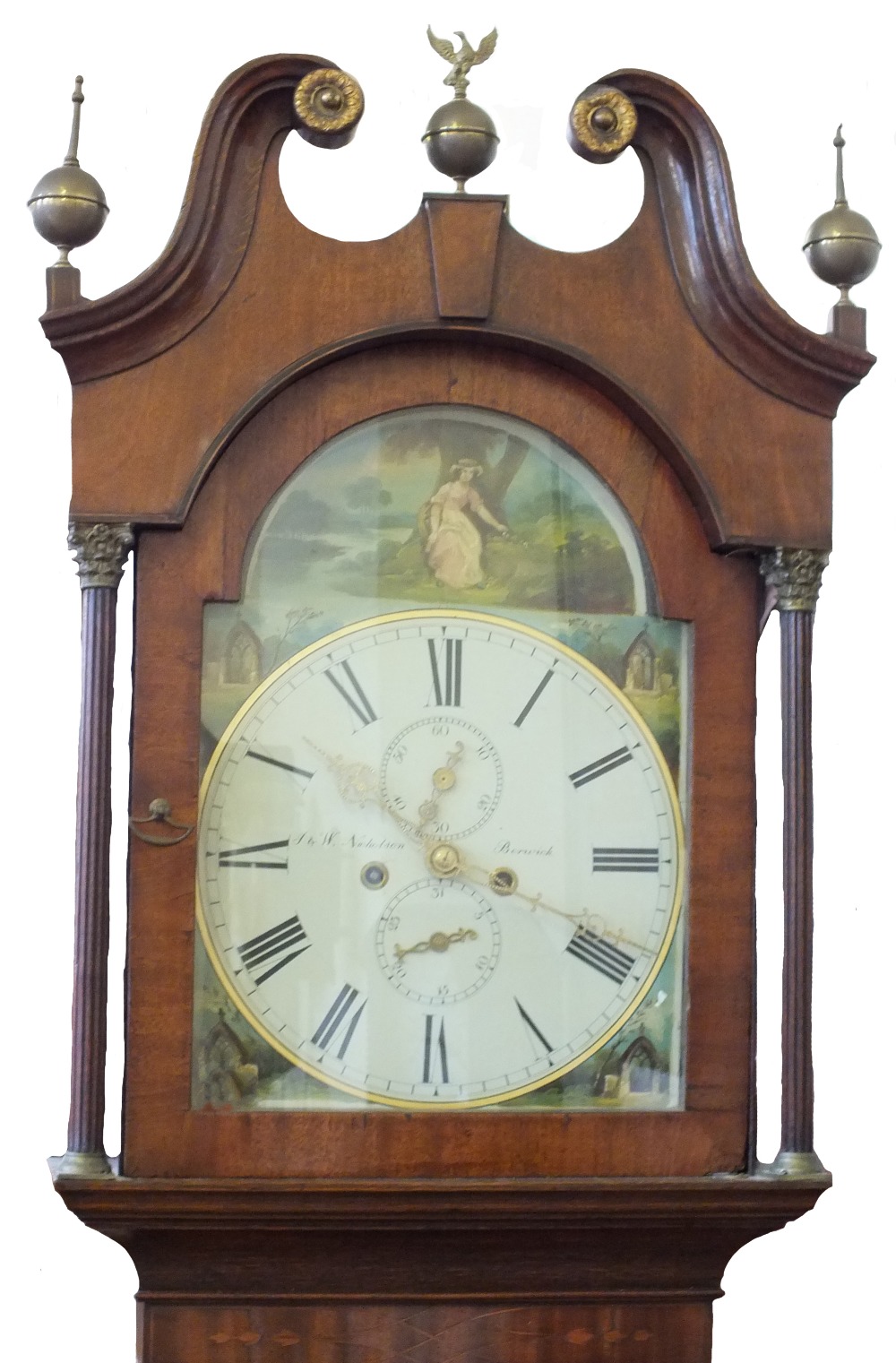 A Mahogany and Oak eight day longcase clock with painted broken arch dial depicting a lady sitting