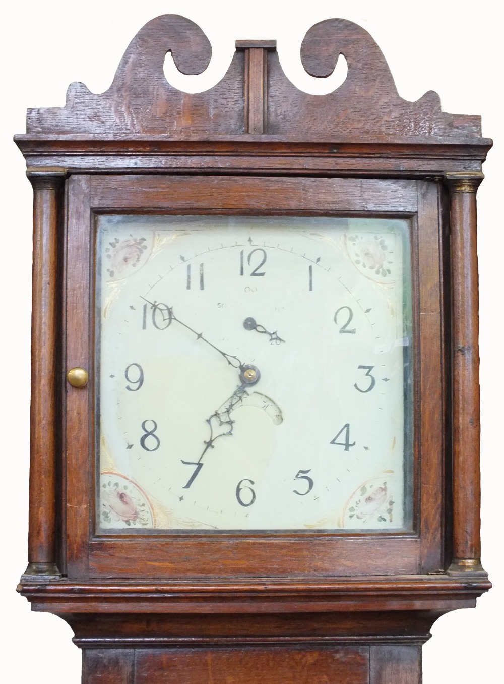 An Oak thirty hour longcase clock with painted 12" dial with rose decoration to the four corners,