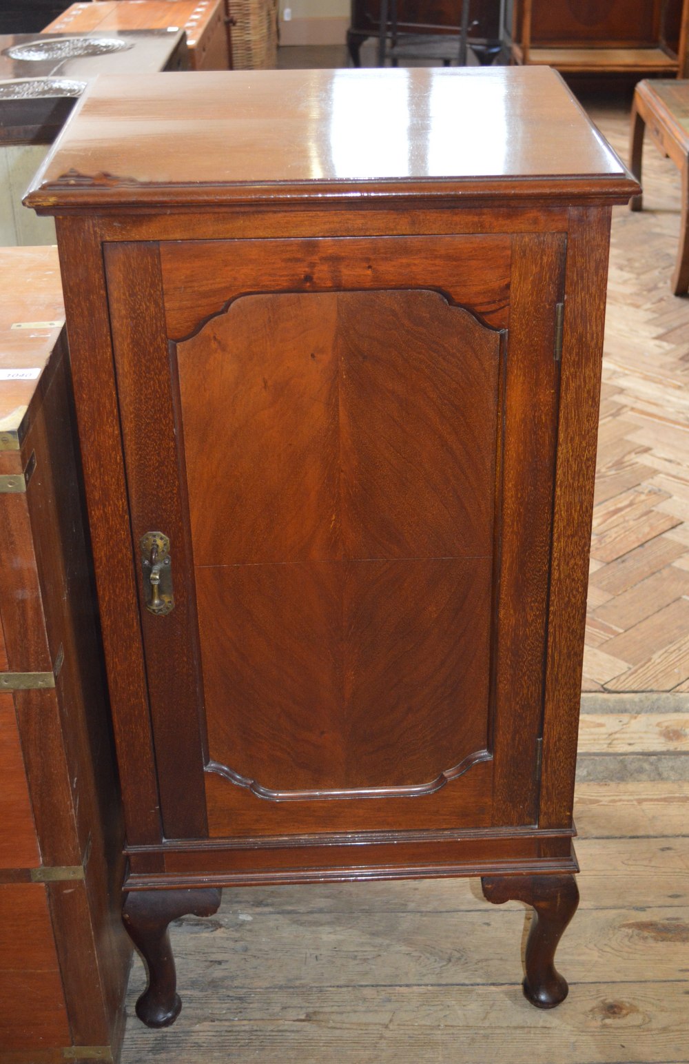 A Mahogany single door cupboard