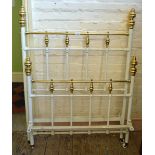 A reproduction white and Brass single bed