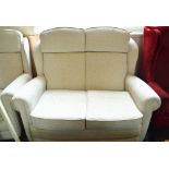 A two seater settee with matching chair