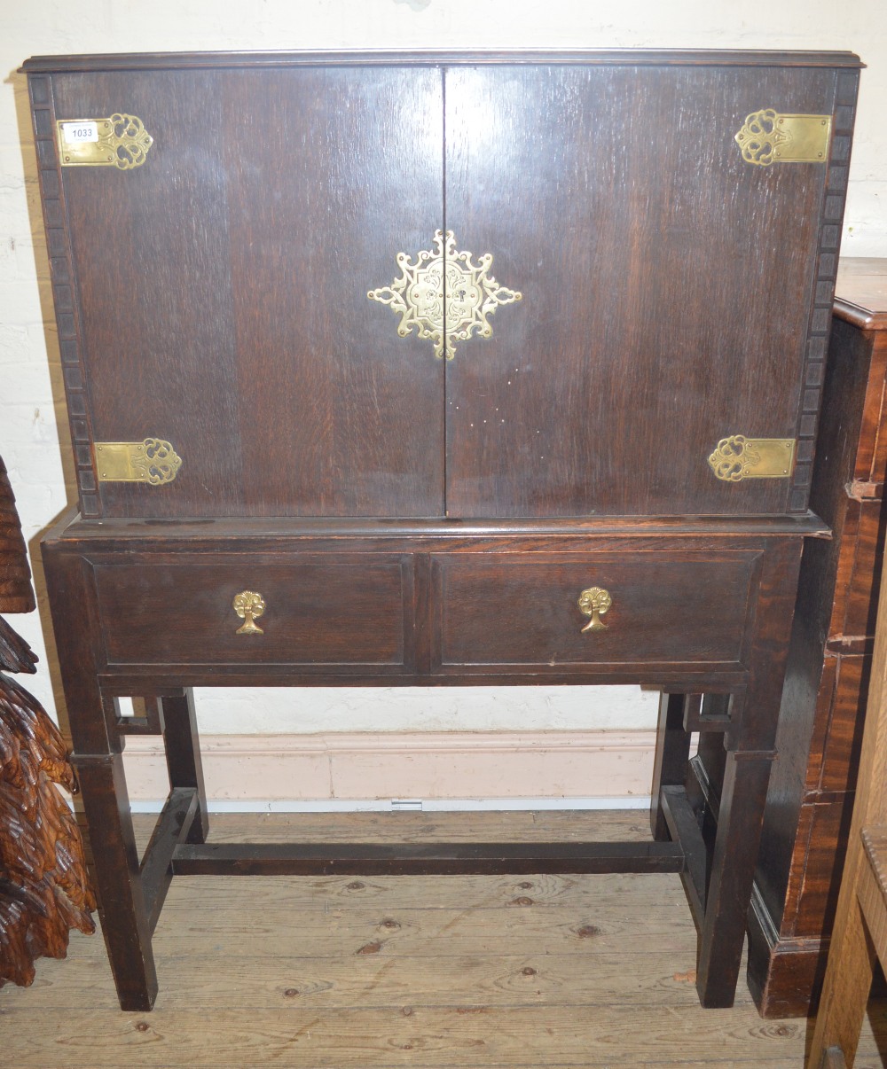 An Oak Brass mounted chest on stand