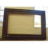 A large faux Oak picture frame