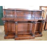 A William IV Mahogany breakfront bookcase with 3/4 gallery with four pilaster and four column