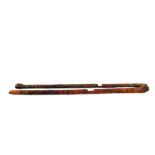 Two carved Japanese walking canes,