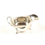 A Silver sauce boat,