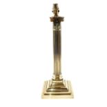 A large Edwardian Corinthian column Brass table lamp on stepped square base,