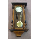 An enamelled dial Mahogany Vienna wall regulator clock