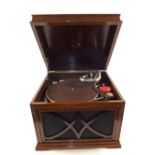An Oak cased HMV table top wind up gramophone and 78's
