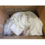 Two boxes of vintage clothing and linen