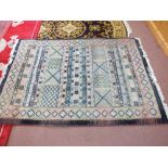 A Egyptian cotton rug,