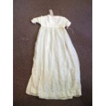 A Victorian embroidered silk christening gown and cape