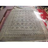 An Afghan brown ground carpet, 142" x 100"
