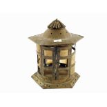 A large 18th Century circular Brass hanging candle lantern with overhanging hexagonal top and base,