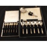 A cased set of seven Silver fruit spoons, Birmingham, and a cased set of six Silver coffee spoons,