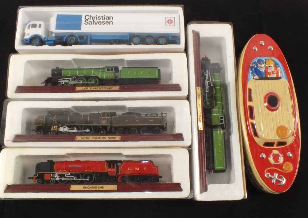 Four boxed model locos,