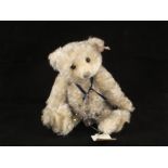 A Steiff blued mohair Christmas bear with Swarovski crystal pendant,