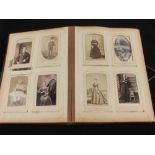 A Victorian photograph album with a quantity of photographs