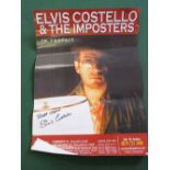 A quantity of film and music posters including a signed Elvis Costello poster