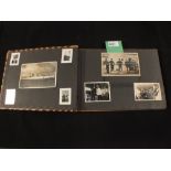 A Third Reich era German photograph album with photographs depicting 'home life' and 'military