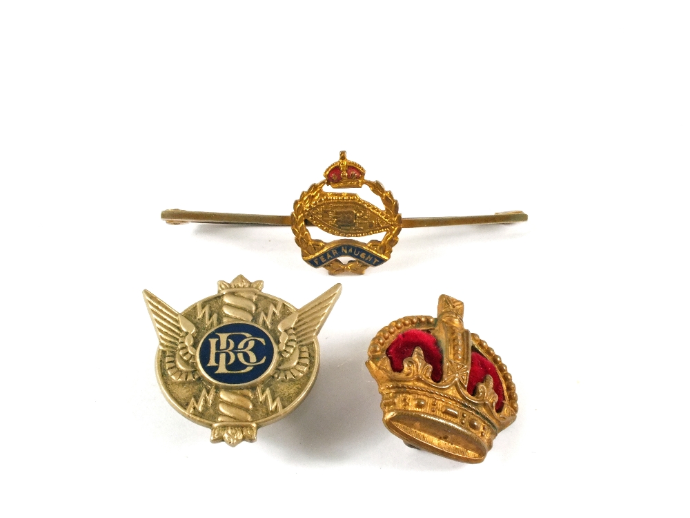 Three badges including Royal Tank Regiment,