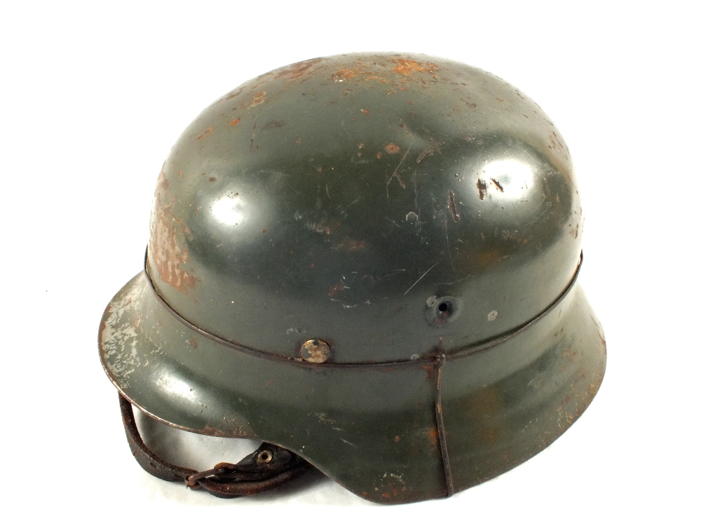 A WWII era German helmet, - Image 2 of 4