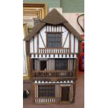 Robert Stubbs Tudor style dolls house and furniture