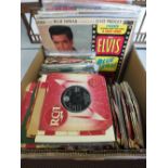 A large quantity of Elvis LP'S and singles including early issues