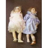 Two large porcelain head dolls