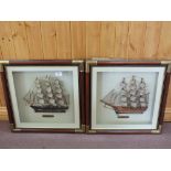 Two framed half hulls of sailboats "Cutty Sark" and "Mayflower"