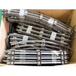 A box of various 0 gauge three rail track