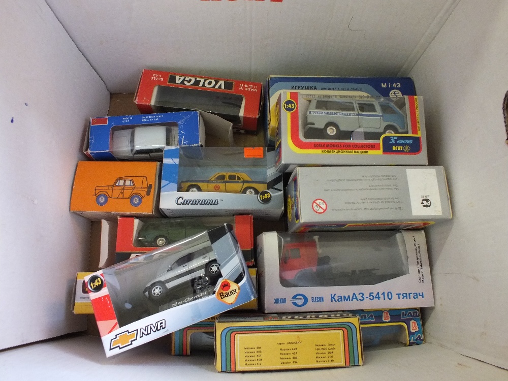 Sixteen boxed Russian die cast models