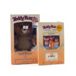 A boxed teddy Ruxpin,